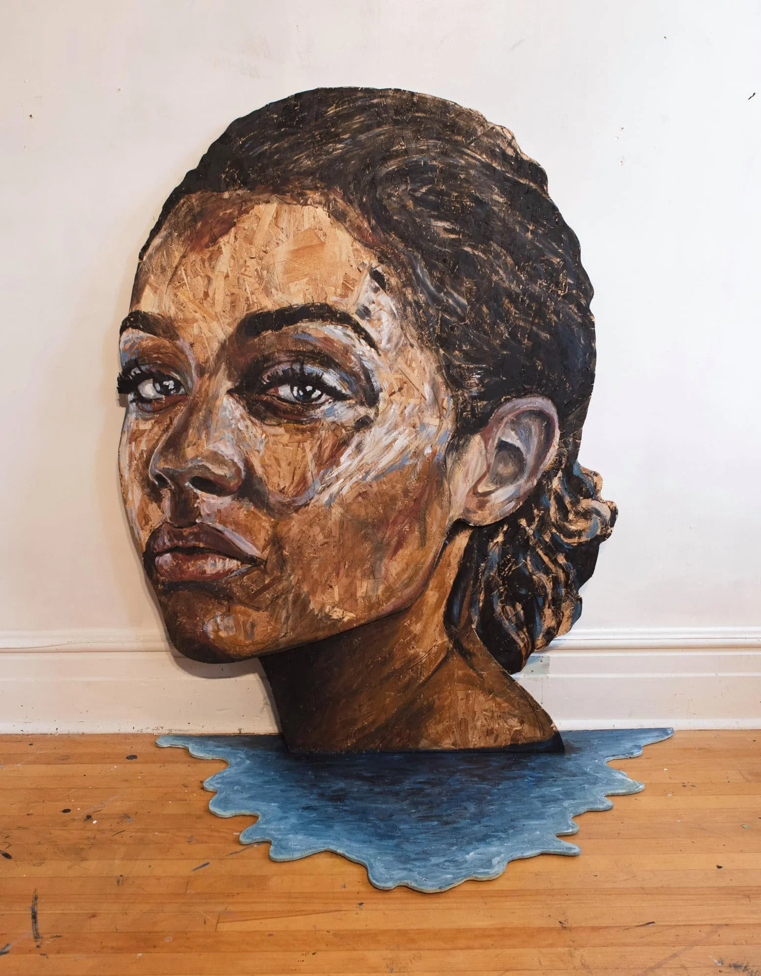 Contemporary mixed media portrait blending painting and sculpture exploring human gaze Quebec artist